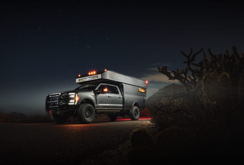 Custom adventure van in desert landscape