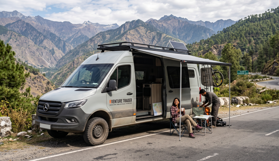 A camper van is parked by the side of the road.